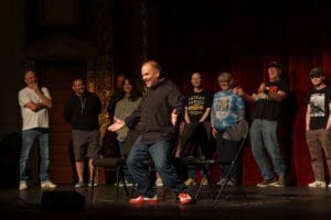 adult improv comedy class performing together on stage