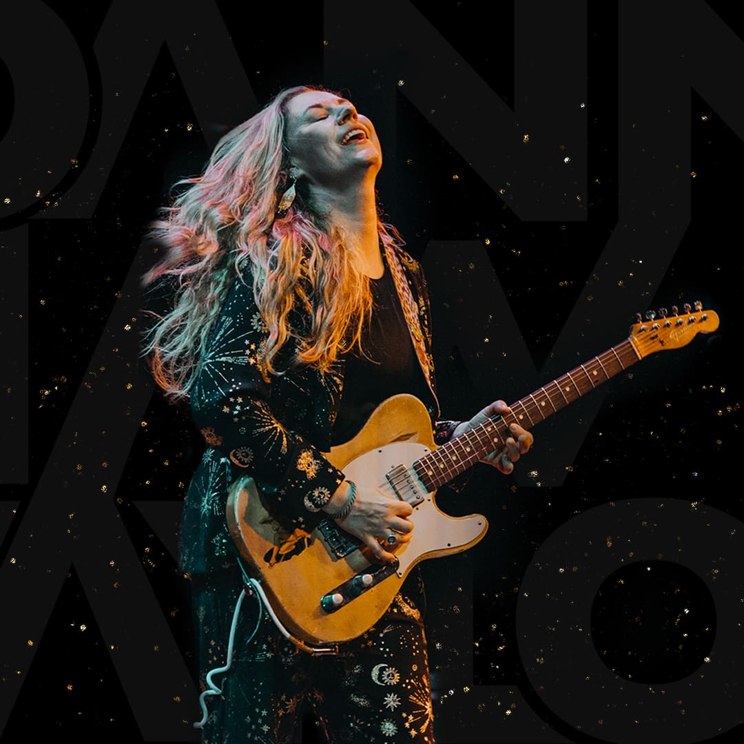 Joanne Shaw Taylor playing guitar on stage