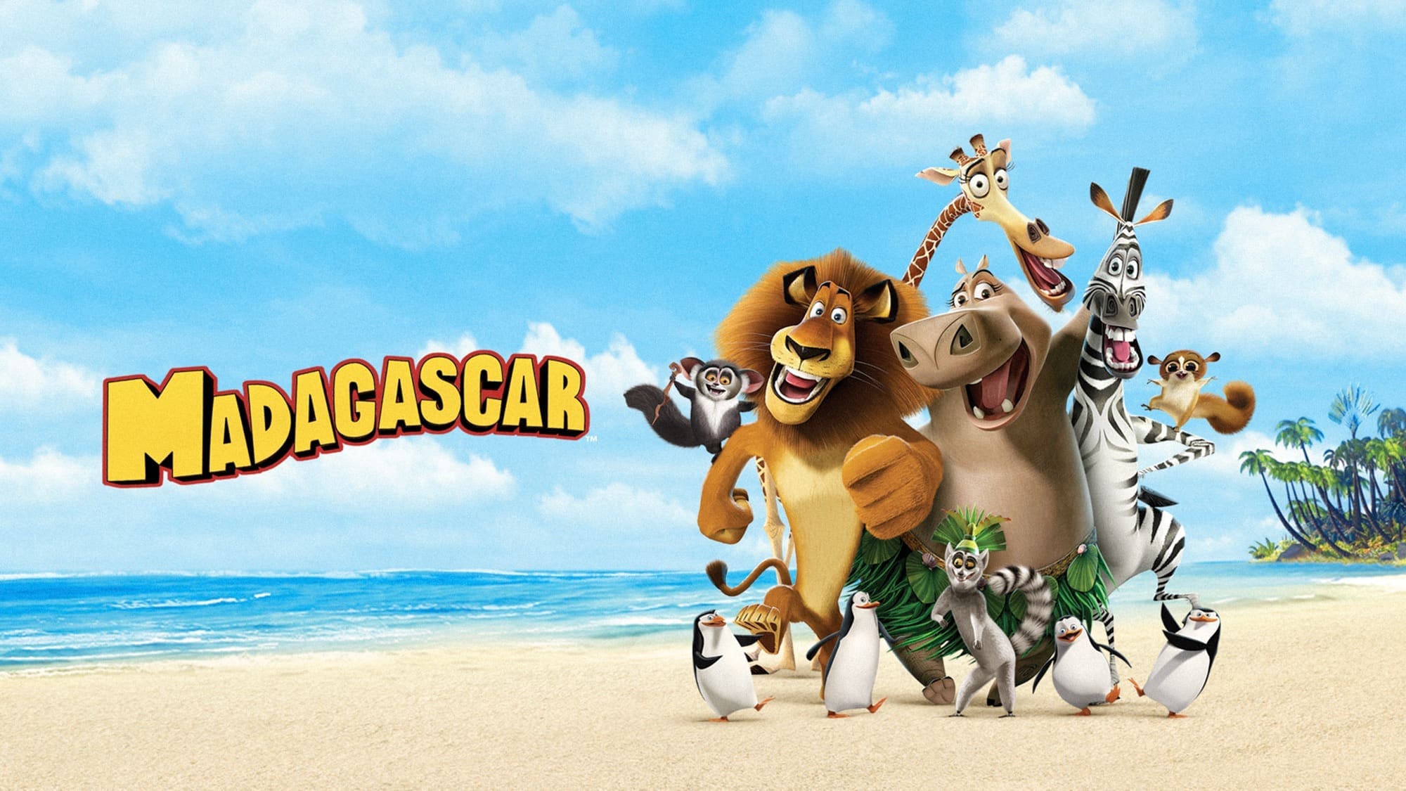 Title poster for the movie Madagascar featuring all the animal characters smiling and posing on the shoreline