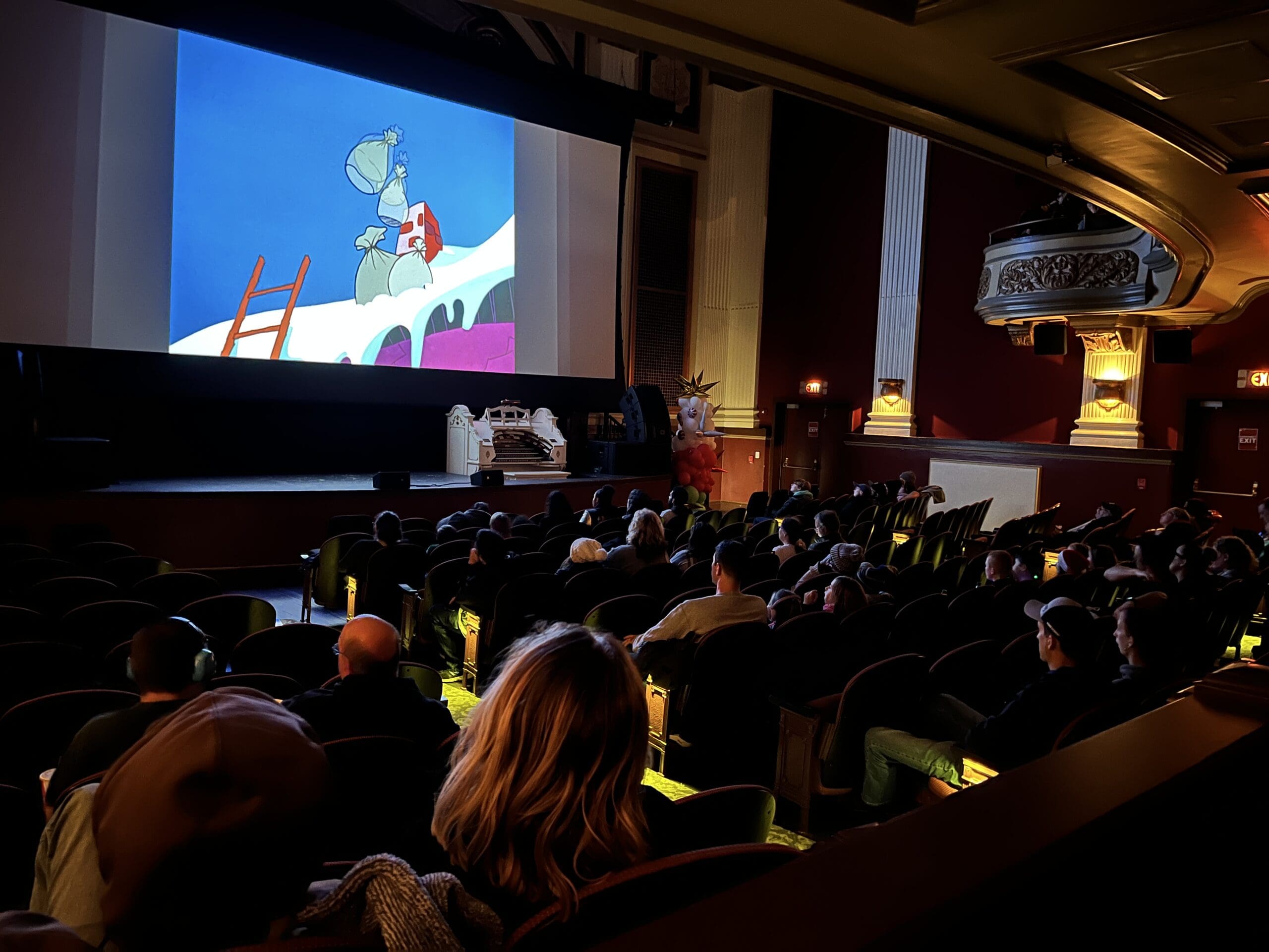 Capitol Theatre audience at holiday film screening