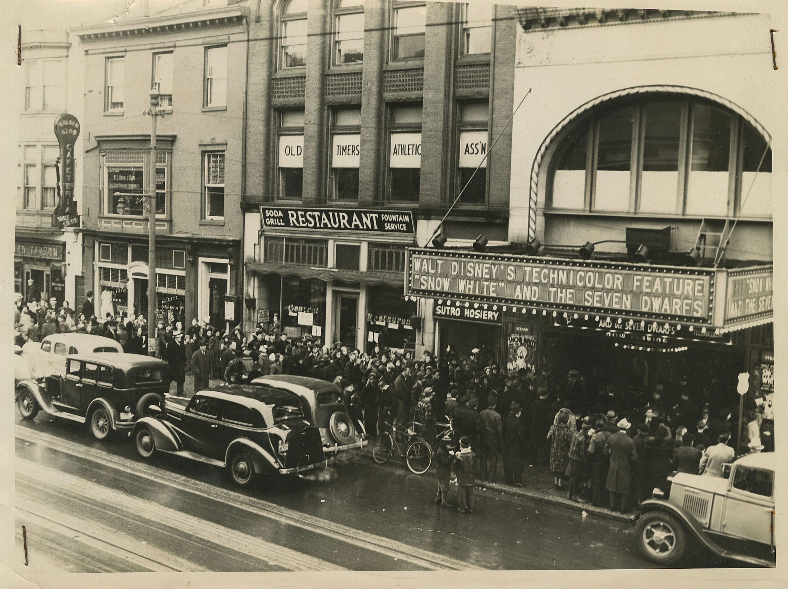 Strand Theatre exterior in 1937 before a screening of Snow White and the Seven Dwarves