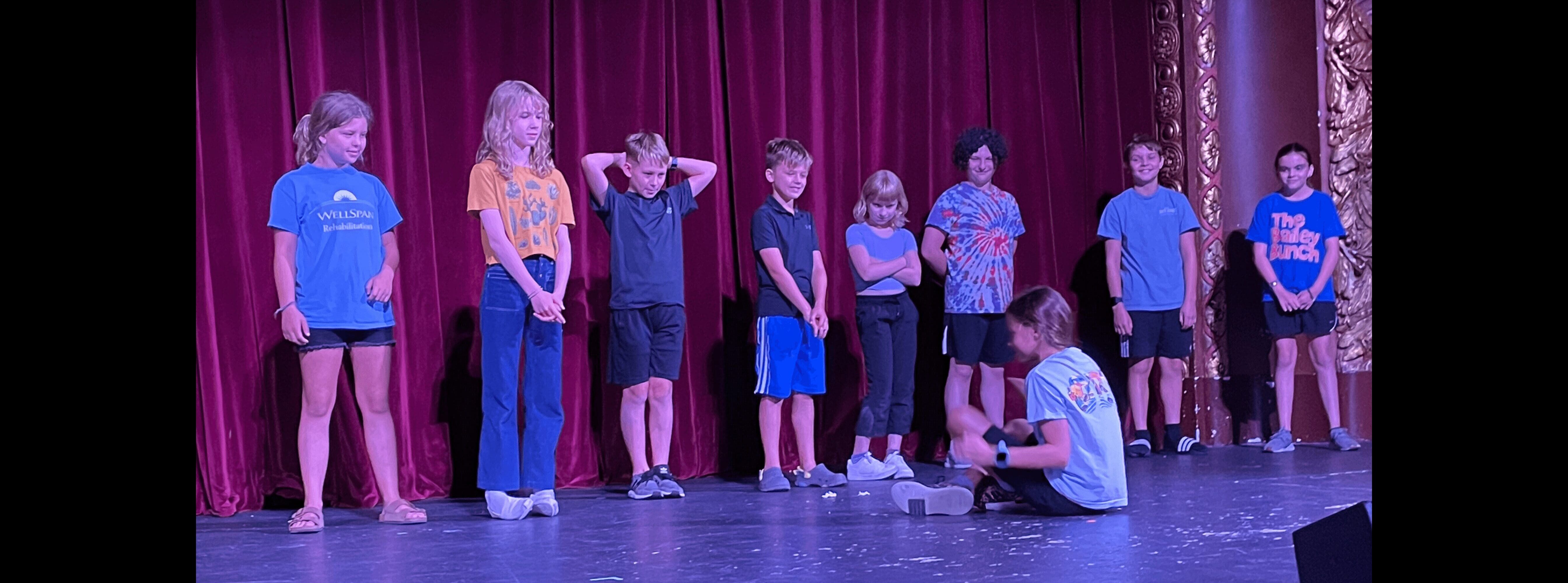 School age children on the Capitol Theatre stage