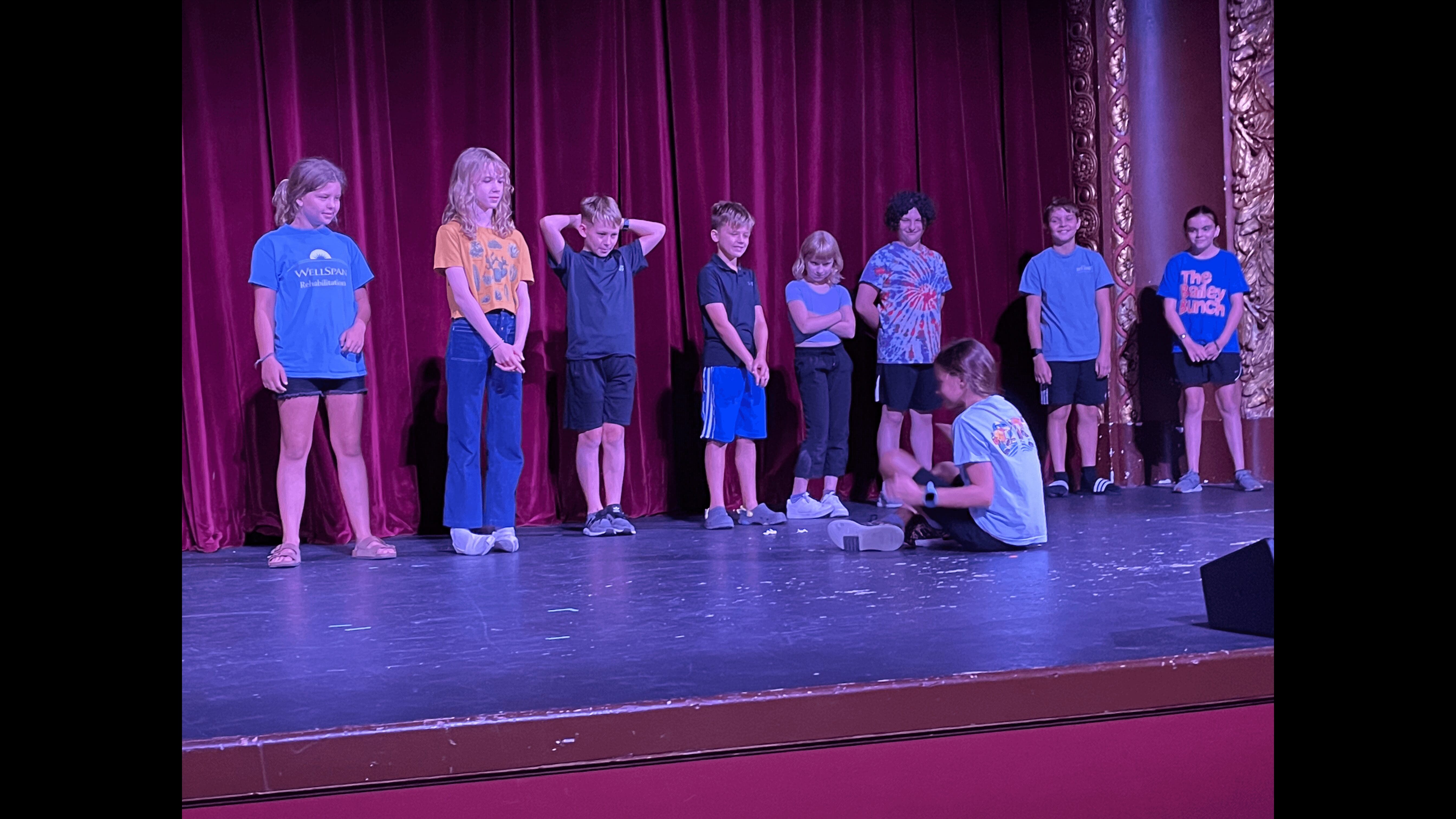 School age children on the Capitol Theatre stage