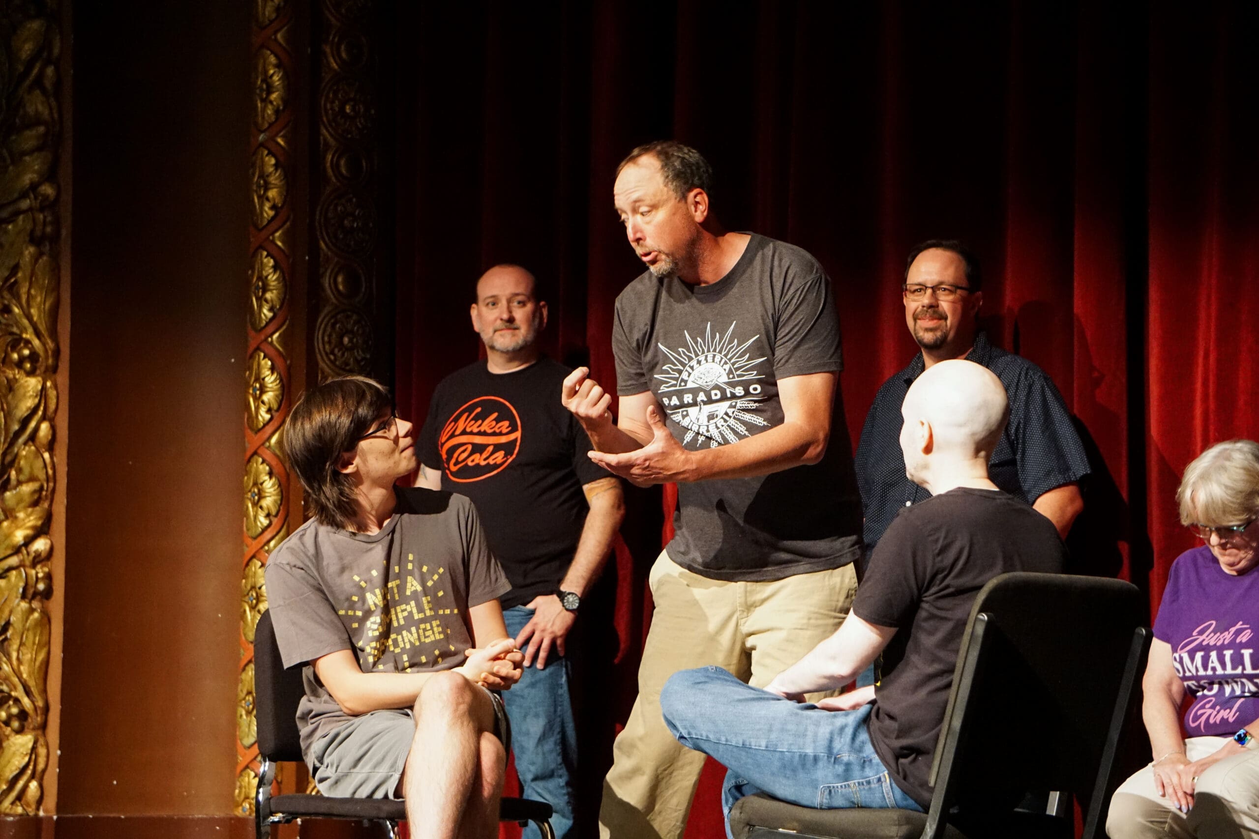 A group of performers on a stage