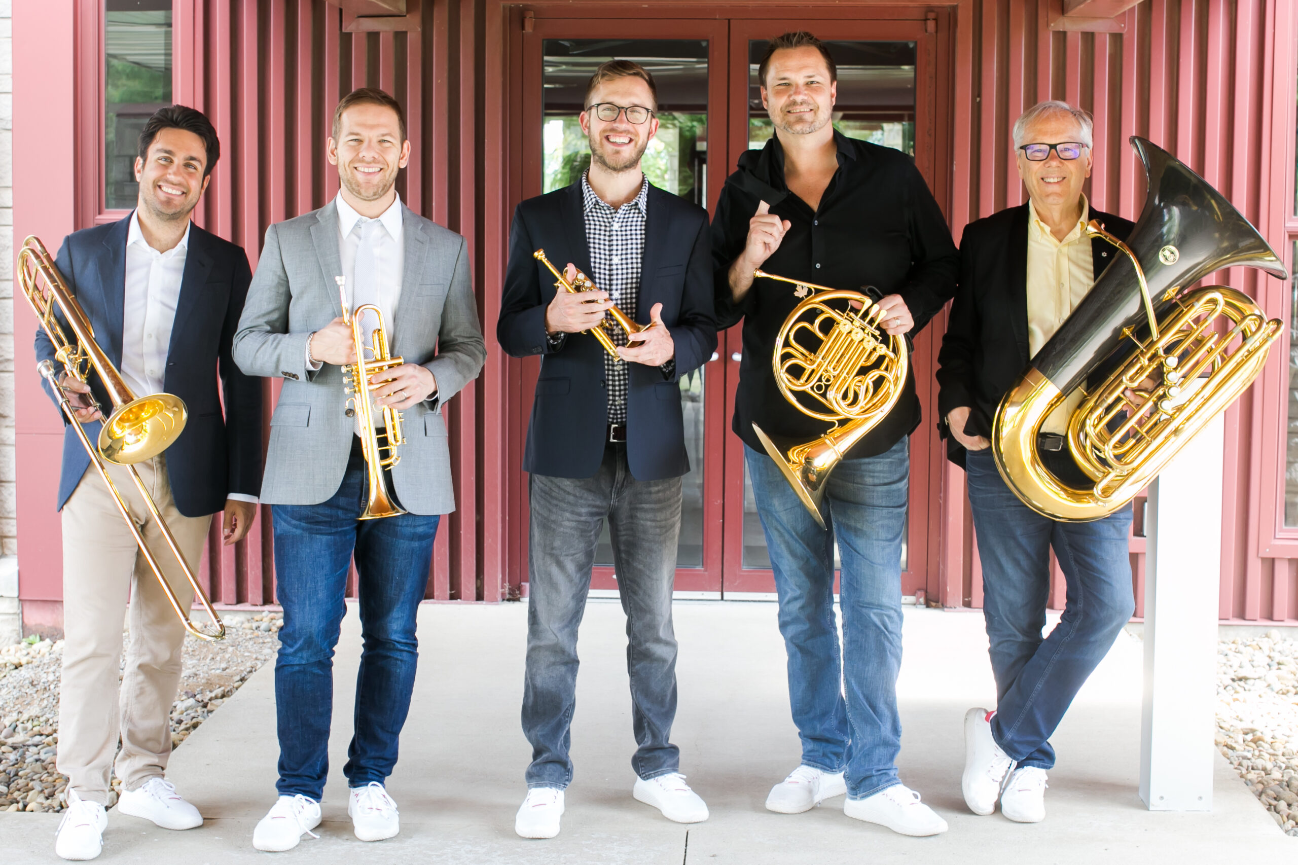 photo of the 5 members of the Canadian Brass holding their instruments