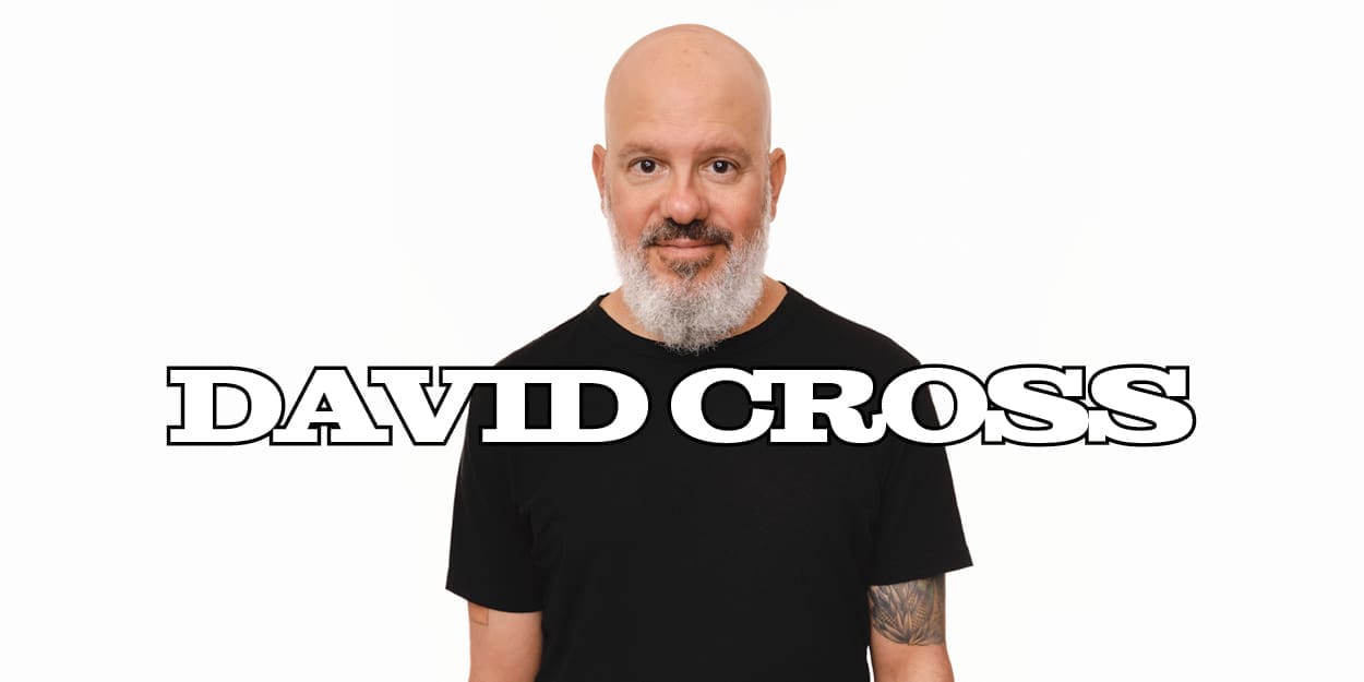 David Cross close-up headshot wearing black t-shirt