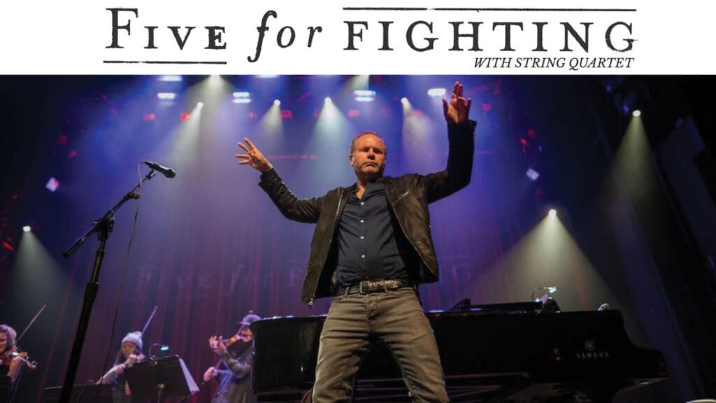 photo of Five For Fighting on stage with band logo at the top