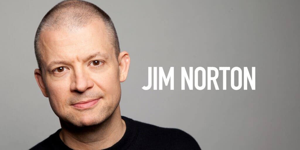 headshot of comedian Jim Norton against a gray background with his name in white capital letters on the right