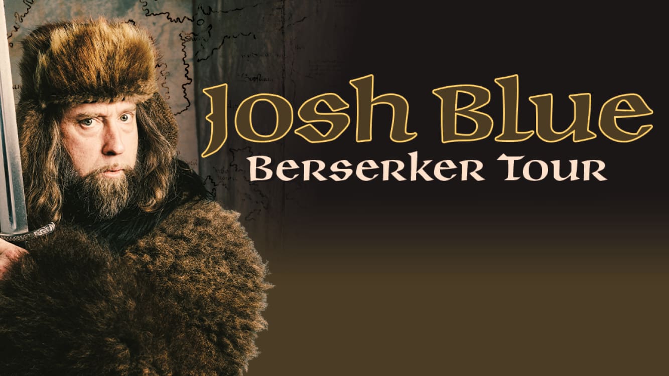 Comedian Josh Blue dressed in fur holding a sword next to his tour title