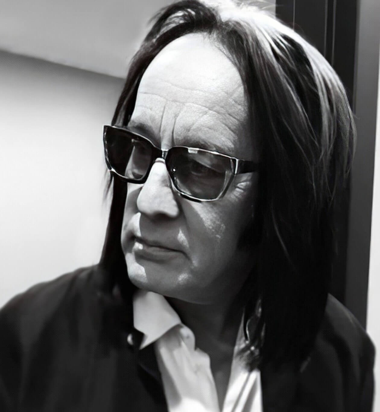 black and white image of Todd Rundgren wearing dark glasses