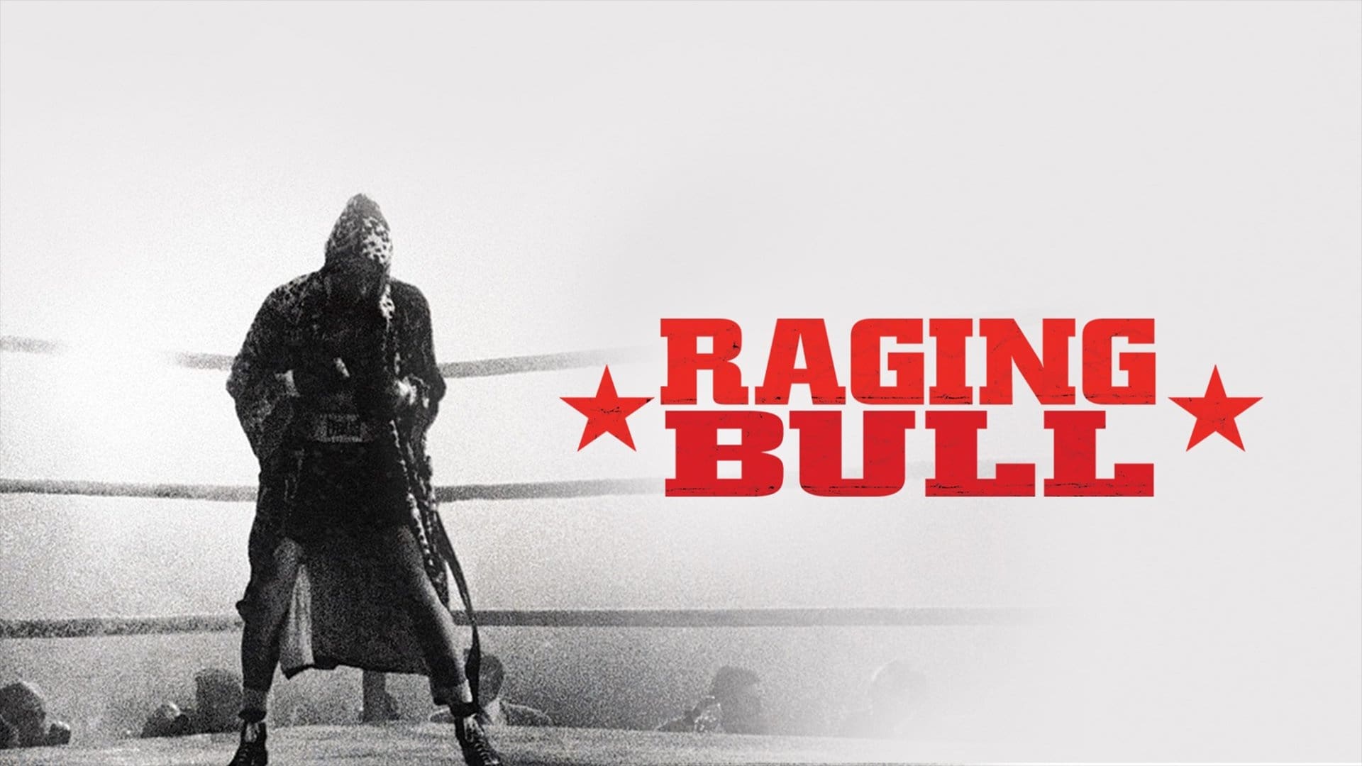 Movie poster for Raging Bull with black and white boxing ring and Reobert DeNiro and red title