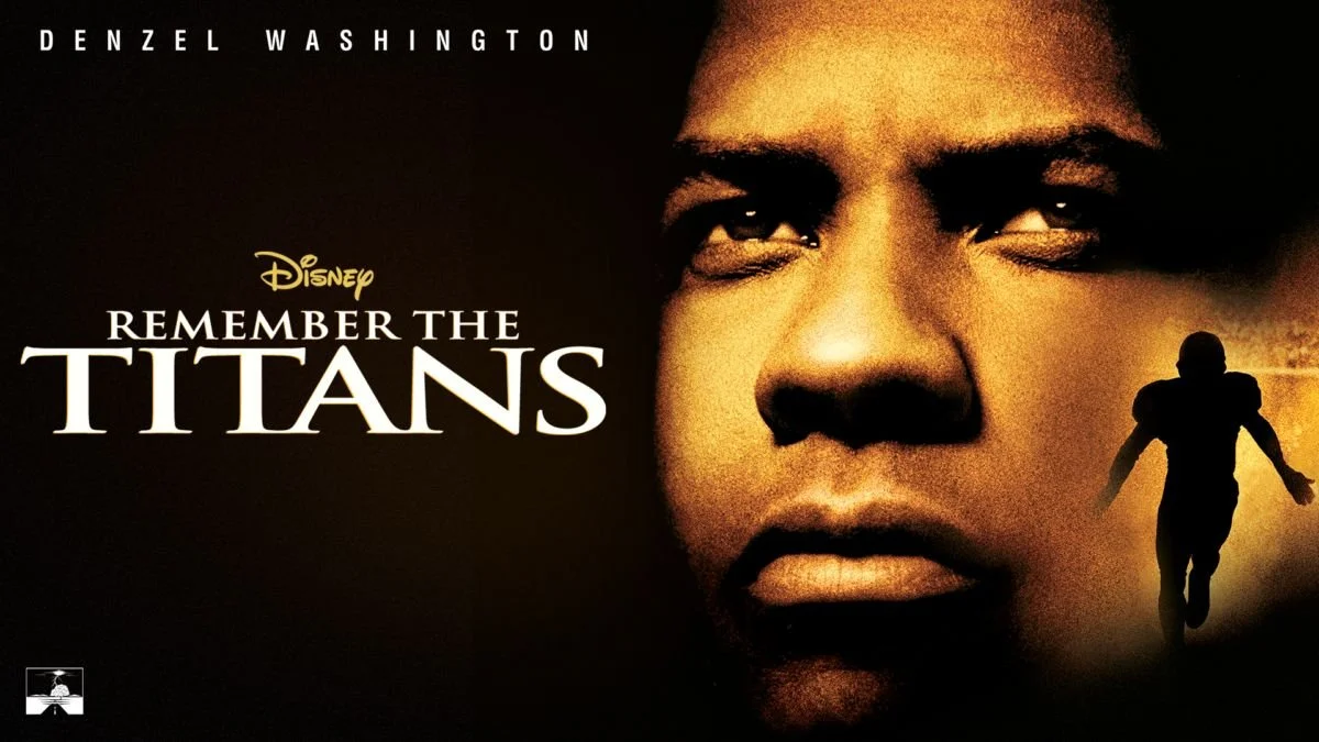 movie poster for Remember the Titans with a close-up of Denzel Washington