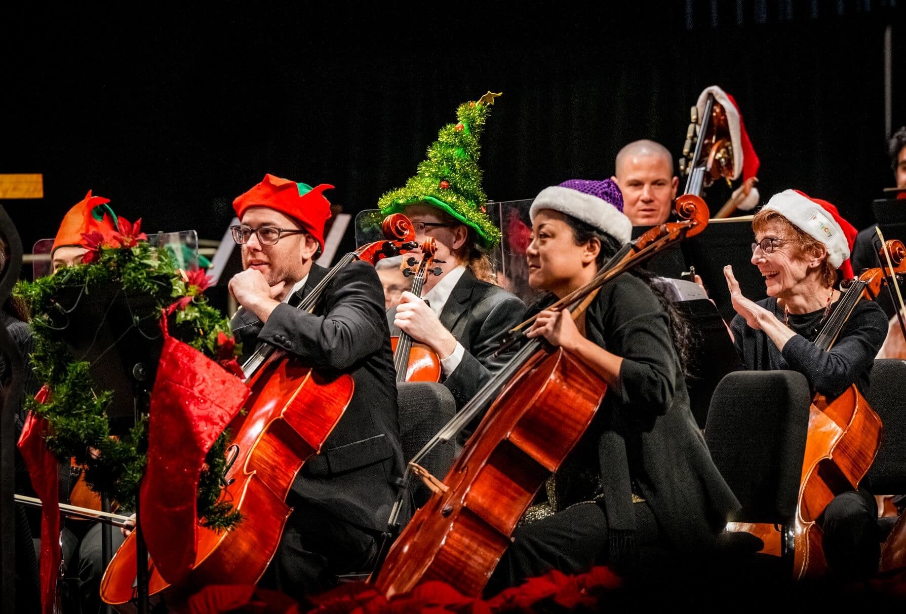 photo of York Symphony cellists with holiday hats