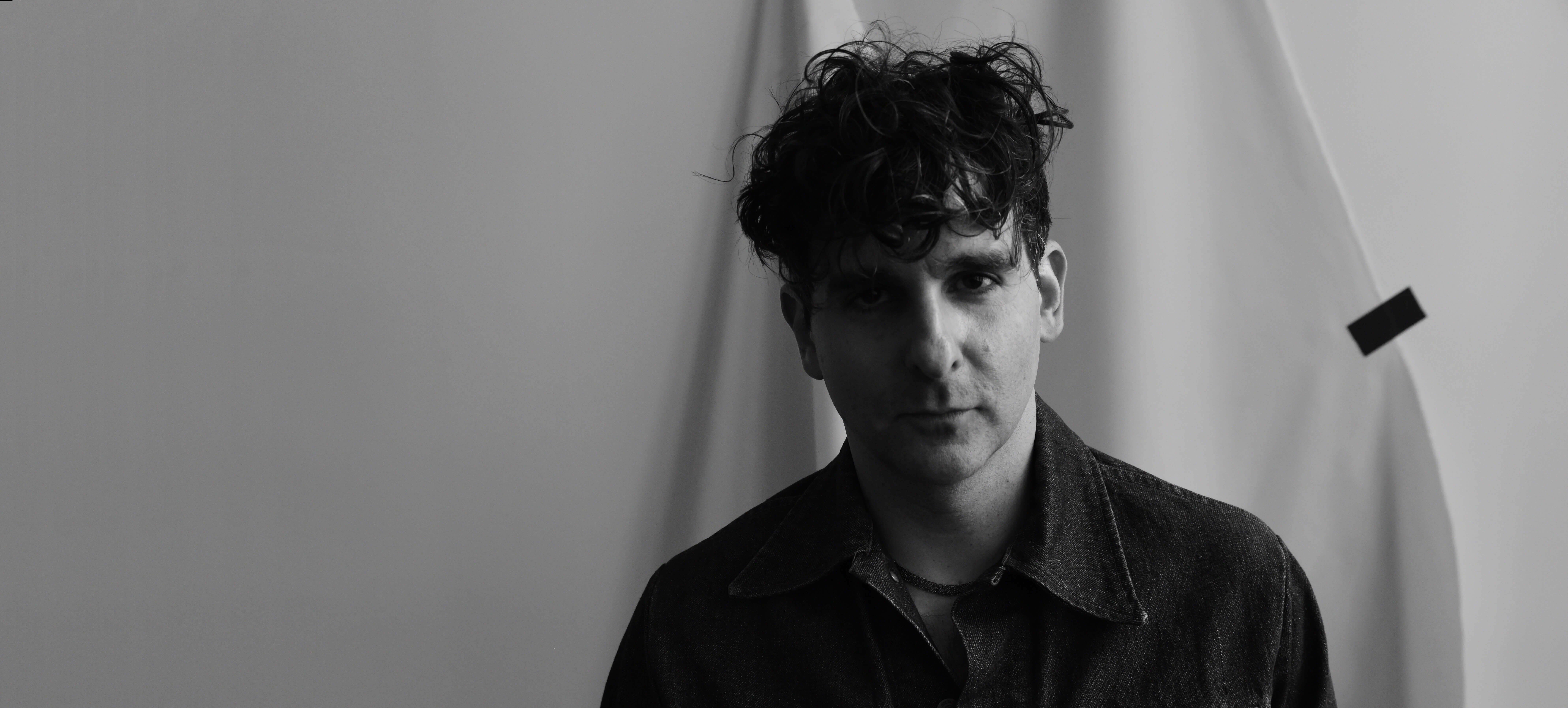 b;ack and white photo of Adam Weiner from Low Cut Connie