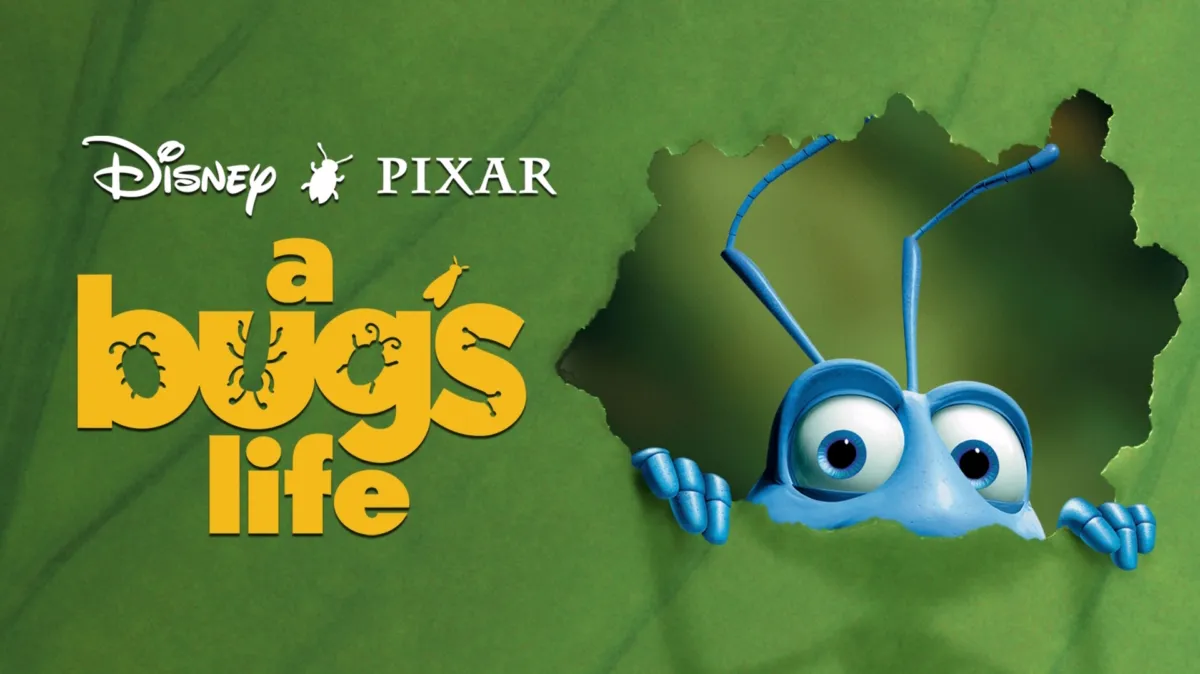 Title poster for the movie A Bug's Life featuring Flik the ant peering through a hole in a green leaf