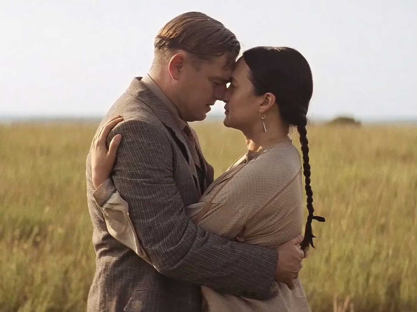 Leonardo DiCaprio and Lily Gladstone embrace in Killers of the Flower Moon