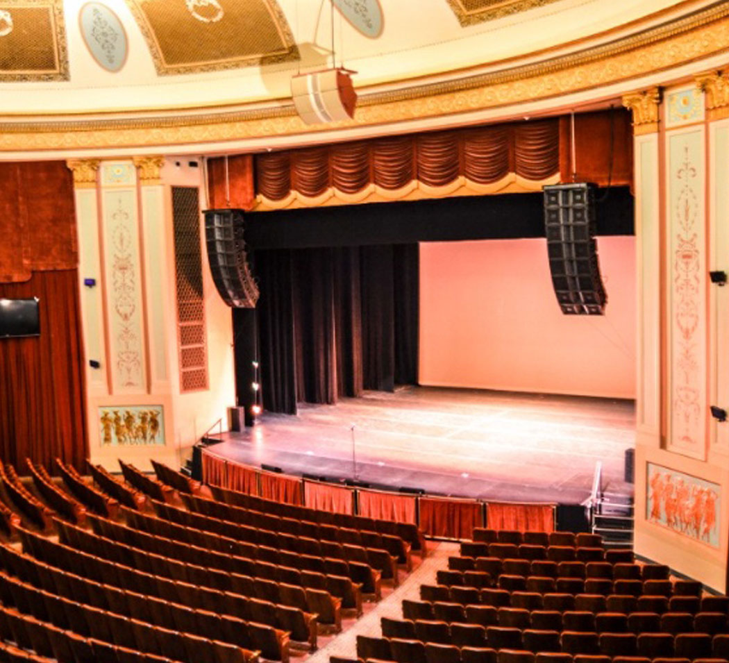 Image of the Strand Theatre stage. The view is from the right balcony.